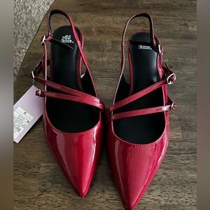 Red buckled strapped kitten heels